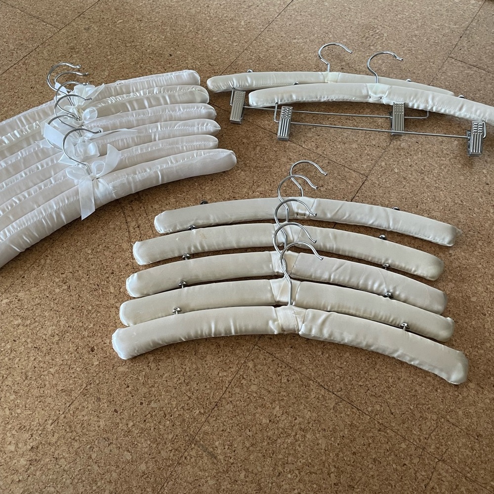 Assorted satin hangers. 13 total. Pants, strapie dresses, blouses